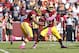 Oct 20, 2013; Landover, MD, USA; Washington Redskins quarterback Robert Griffin III (10) hands the ball off to Redskins running back Alfred Morris (46) during the first quarter against the Chicago Bears at FedEx Field. Mandatory Credit: Geoff Burke-USA TODAY Sports