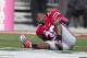 October 20, 2012; Columbus, OH, USA; Ohio State Buckeyes defensive back Devan Bogard (30) waits for team trainers after being injured int he game against the Purdue Boilermakers at Ohio Stadium. Ohio State won the game 29-22 in overtime. Mandatory Credit: Greg Bartram-USA TODAY Sports