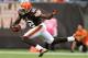 Oct 13, 2013; Cleveland, OH, USA; Cleveland Browns wide receiver Josh Gordon (12) makes a pass reception against the Detroit Lions during the second quarter at FirstEnergy Stadium. Mandatory Credit: Ron Schwane-USA TODAY Sports