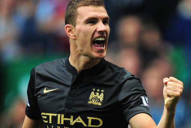 Hi-res-182107103-manchester-city-player-edin-dzeko-celebrates-after_crop_north