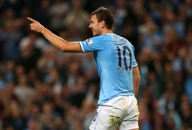 Hi-res-181745112-edin-dzeko-of-manchester-city-celebrates-after-scoring_crop_north