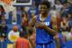 Oct 4, 2013; Lawrence, KS, USA; Kansas Jayhawks guard Andrew Wiggins (22) laughs with team mates after scoring during Late Night at Allen Fieldhouse. Mandatory Credit: Denny Medley-USA TODAY Sports