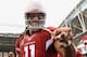 GLENDALE, AZ - OCTOBER 27: Wide receiver Larry Fitzgerald #11 of the Arizona Cardinals walks off the field before the NFL game against the Atlanta Falcons at the University of Phoenix Stadium on October 27, 2013 in Glendale, Arizona. The Cardinals defeated the Falcons 27-13. (Photo by Christian Petersen/Getty Images)