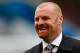 BURNLEY, ENGLAND - OCTOBER 26: Manager Sean Dyche of Burnley smiles during the Sky Bet Championship match between Burnley and Queens Park Rangers at Turf Moor on October 26, 2013 in Burnley, England. (Photo by Paul Thomas/Getty Images)