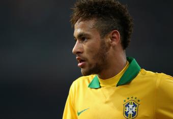 Hi-res-184688994-neymar-of-brazil-looks-on-during-the-international_crop_north