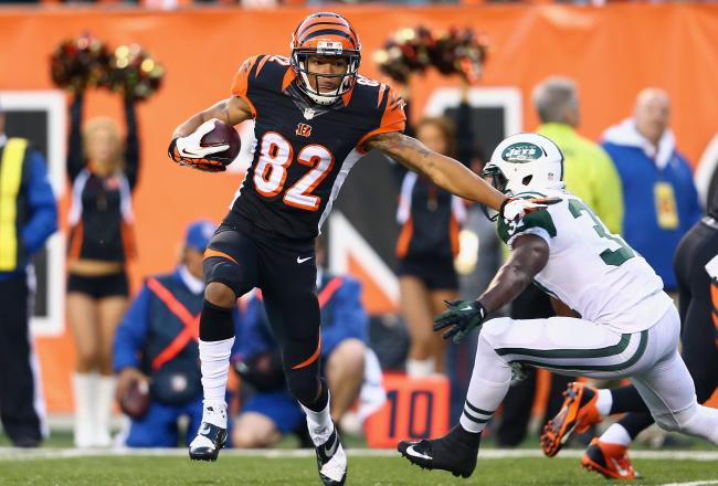 Hi-res-186054608-marvin-jones-of-the-cincinnati-bengals-runs-for-a_crop_north