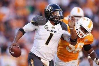 Hi-res-155994166-james-franklin-of-the-missouri-tigers-runs-with-the_crop_north