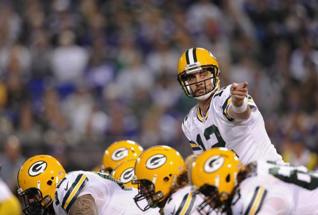 Hi-res-186060019-aaron-rodgers-of-the-green-bay-packers-calls-a-play-at_crop_north