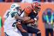 CINCINNATI, OH - OCTOBER 27: Marvin Jones #82 of the Cincinnati Bengals runs with the ball while defended by Dee Milliner #27 of the New York Jets during the game at Paul Brown Stadium on October 27, 2013 in Cincinnati, Ohio. (Photo by Andy Lyons/Getty Images)