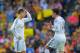 BARCELONA, SPAIN - OCTOBER 26: Cristiano Ronaldo (L) and Gareth Bale of Real Madrid CF react after Barcelona scored their opening goal during the La Liga match between FC Barcelona and Real Madrid CF at Camp Nou stadium on October 26, 2013 in Barcelona, Spain. (Photo by Denis Doyle/Getty Images)