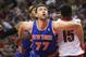 Oct 11, 2013; Toronto, Ontario, CAN; New York Knicks forward Andrea Bargnani (77) tries to box out Toronto Raptors center Amir Johnson (15) as he looks for a rebound at Air Canada Centre. The Raptors beat the Knicks 100-91. Mandatory Credit: Tom Szczerbowski-USA TODAY Sports