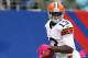 EAST RUTHERFORD, NJ - OCTOBER 07: Josh Gordon #13 of the Cleveland Browns runs the ball in for a touchdown in the first quarter against the New York Giants on October 7, 2012 at MetLife Stadium in East Rutherford, New Jersey. (Photo by Elsa/Getty Images)