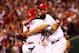ST LOUIS, MO - OCTOBER 09: Adam Wainwright #50 celebrates with Yadier Molina #4 of the St. Louis Cardinals after they defeated the Pittsburgh Pirates 6 to 1 in Game Five of the National League Division Series at Busch Stadium on October 9, 2013 in St Louis, Missouri. (Photo by Dilip Vishwanat/Getty Images)