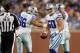 DETROIT, MI - OCTOBER 27: Sean Lee #50 of the Dallas Cowboys celebrates his first quarter interception with Nick Hayden #96 while playing the Detroit Lions at Ford Field on October 27, 2013 in Detroit, Michigan. (Photo by Gregory Shamus/Getty Images)