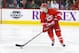 October 28, 2013; Raleigh, NC, USA; Carolina Hurricanes defensemen Ryan Murphy (7) carries the puck against the Pittsburgh Penguins at PNC Center. The Pittsburgh Penguins defeated the Carolina Hurricanes 3-1. Mandatory Credit: James Guillory-USA TODAY Sports