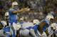SAN DIEGO, CA - OCTOBER 14: Quarterback Philip Rivers #17 of the San Diego Chargers calls the play at the line of scrimmage against Indianapolis Colts late in the 4th quarter of their NFL Game on October 14, 2013 at Qualcomm Stadium in San Diego, California. The Chargers won 19-9. (Photo by Donald Miralle/Getty Images)