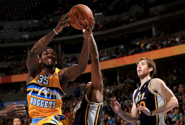 Hi-res-155956334-kenneth-faried-of-the-denver-nuggets-controls-the-ball_crop_north
