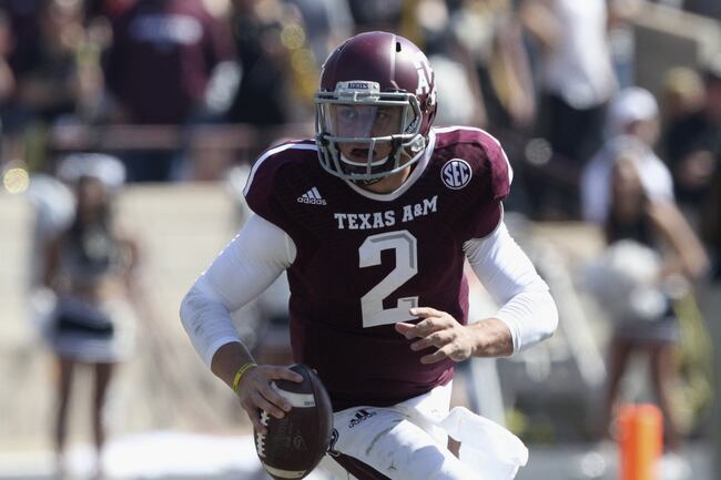 Hi-res-185942971-johnny-manziel-of-the-texas-a-m-aggies-rolls-out_crop_north