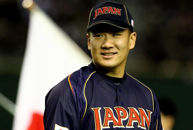 Hi-res-163475595-pitcher-masahiro-tanaka-of-japan-looks-on-the-world_crop_north