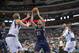 Oct 7, 2013; Dallas, TX, USA; Dallas Mavericks power forward Dirk Nowitzki (41) and small forward Shawn Marion (0) guards New Orleans Pelicans power forward Ryan Anderson (33) during the first quarter at the American Airlines Center. Mandatory Credit: Jerome Miron-USA TODAY Sports