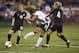 Oct 30, 2013; Columbus, OH, USA; USA forward Sydney Leroux (2) scores on this shot between New Zealand midfielders Kirsty Yallop (11) and Katie Hoyle (4)at Columbus Crew Stadium. Mandatory Credit: Greg Bartram-USA TODAY Sports