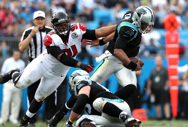 http://img.bleacherreport.net/img/images/photos/002/585/884/hi-res-158027418-cam-newton-of-the-carolina-panthers-breaks-away-from_crop_north.jpg?w=650&h=440&q=75