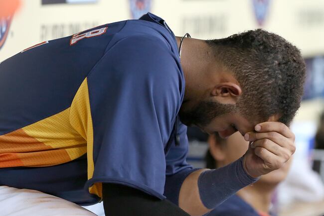 Hi-res-180650637-jonathan-villar-of-the-houston-astros-looks-dejected-in_crop_north