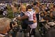 INDIANAPOLIS, IN - DECEMBER 30: Head coach Chuck Pagano of the Indianapolis Colts hugs Andre Johnson #80 of the Houston Texans after a win at Lucas Oil Stadium on December 30, 2012 in Indianapolis, Indiana. The Colts defeated the Texans 28-16. (Photo by Jonathan Daniel/Getty Images)