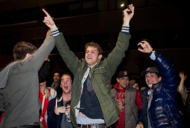 Hi-res-186403113-fans-celebrate-in-the-street-near-fenway-park-after-the_crop_north