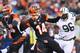 CINCINNATI, OH - OCTOBER 27: Andy Dalton #14 of the Cincinnati Bengals throws a pass during the NFL game against the New York Jets at Paul Brown Stadium on October 27, 2013 in Cincinnati, Ohio. (Photo by Andy Lyons/Getty Images)