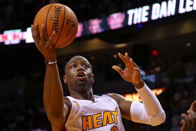 Hi-res-186259343-dwyane-wade-of-the-miami-heat-drives-to-the-basket_crop_north
