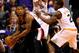 Oct 30, 2013; Phoenix, AZ, USA; Portland Trail Blazers guard Damian Lillard (left) controls the ball against Phoenix Suns guard Eric Bledsoe (2) and Marcus Morris (15) in the second half at US Airways Center. The Suns defeated the Blazers 104-91. Mandatory Credit: Mark J. Rebilas-USA TODAY Sports