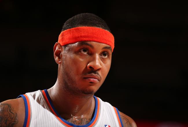 Hi-res-186212540-carmelo-anthony-of-the-new-york-knicks-looks-on-during_crop_north