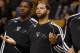 Oct 23, 2013; Boston, MA, USA; Brooklyn Nets point guard Deron Williams (8) (center) reacts after a play as they take on the Boston Celtics during the second half at TD Garden. The Celtics defeated the Brooklyn Nets 101-97. Mandatory Credit: David Butler II-USA TODAY Sports