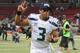 ST. LOUIS, MO - OCTOBER 28: Russell Wilson #3 of the Seattle Seahawks celebrates after defeating the St. Louis Rams, by the score of 14-9 at the Edward Jones Dome on October 28, 2013 in St. Louis, Missouri. (Photo by Michael Thomas/Getty Images)