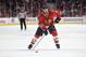Jun 2, 2013; Chicago, IL, USA; Chicago Blackhawks defenseman Brent Seabrook (7) shoots and scores a goal against the Los Angeles Kings during the first period in game two of the Western Conference finals of the 2013 Stanley Cup Playoffs at the United Center. Mandatory Credit: Rob Grabowski-USA TODAY Sports