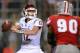 Sep 14, 2012; Las Vegas, NV, USA; Washington State Cougars quarterback Connor Halliday (12) drops back to pass while UNLV Rebels defensive lineman Parker Holloway (90) rushes during the second quarter at Sam Boyd Stadium. Mandatory Credit: Jake Roth-USA TODAY Sports