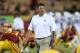 LOS ANGELES, CA - OCTOBER 10: Interim head coach Ed Orgeron of the USC Trojans leads his team as they warm up for the game against the Arizona Wildcats at Los Angeles Coliseum on October 10, 2013 in Los Angeles, California. (Photo by Stephen Dunn/Getty Images)