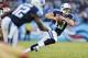 NASHVILLE, TN - OCTOBER 20: Jake Locker #10 of the Tennessee Titans runs the ball against the San Francisco 49ers at LP Field on October 20, 2013 in Nashville, Tennessee. The 49ers defeated the Titans 31-17. (Photo by Wesley Hitt/Getty Images)