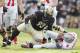WEST LAFAYETTE, IN - NOVEMBER 12: Kawann Short #93 of the Purdue Boilermakers celebrates after sacking Braxton Miller #5 of the Ohio State Buckeyes at Ross-Ade Stadium on November 12, 2011 in West Lafayette, Indiana. Purdue defeated Ohio State 26-23 in overtime. (Photo by Joe Robbins/Getty Images)