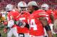 COLUMBUS, OH - OCTOBER 19: Quarterback Braxton Miller #5 of the Ohio State Buckeyes celebrates with Jamal Marcus #34 of the Ohio State Buckeyes after the Buckeyes defeated the Iowa Hawkeyes 34-24 at Ohio Stadium on October 19, 2013 in Columbus, Ohio. (Photo by Jamie Sabau/Getty Images)