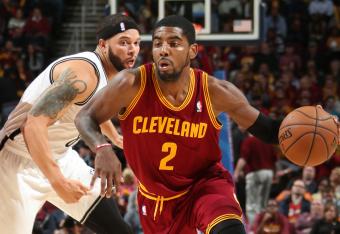 Hi-res-186393073-kyrie-irving-of-the-cleveland-cavaliers-drives-against_crop_north