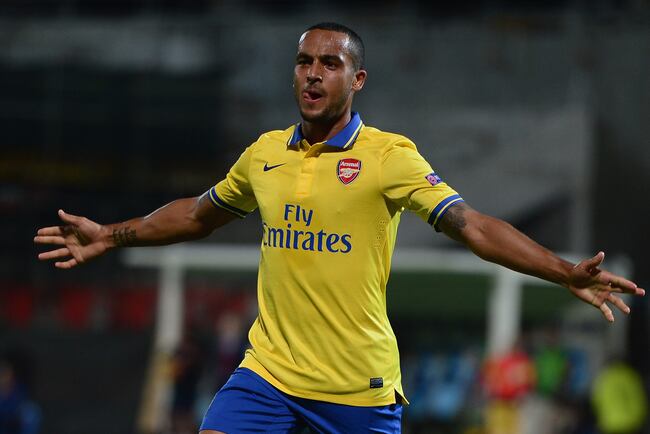 Hi-res-180963792-theo-walcott-of-arsenal-celebrates-his-goal-during-the_crop_north