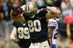NEW ORLEANS, LA - OCTOBER 27: Jimmy Graham #80 of the New Orleans Saints celebrates after scoring a touchdown against the Buffalo Bills at Mercedes-Benz Superdome on October 27, 2013 in New Orleans, Louisiana. (Photo by Chris Graythen/Getty Images)