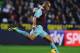 SWANSEA, WALES - OCTOBER 27: Winston Reid of West Ham United kicks the ball during the Barclays Premier League match between Swansea City and West Ham United at Liberty Stadium on October 27, 2013 in Swansea, Wales. (Photo by Tom Dulat/Getty Images)