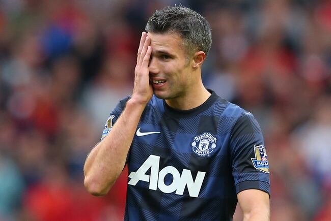 Hi-res-179188202-robin-van-persie-of-manchester-united-reacts-during-the_crop_north