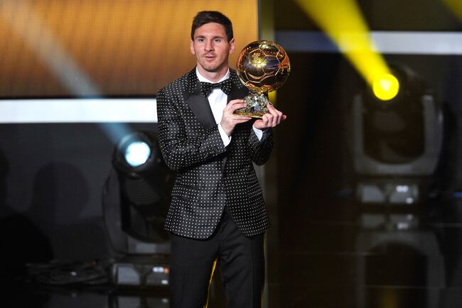 Hi-res-159116700-lionel-messi-of-argentina-holds-the-trophy-after_crop_north