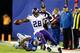EAST RUTHERFORD, NJ - OCTOBER 21: Running back Adrian Peterson #28 of the Minnesota Vikings avoids a tackle by defensive back Will Hill #25 of the New York Giants during a game at MetLife Stadium on October 21, 2013 in East Rutherford, New Jersey. (Photo by Elsa/Getty Images)