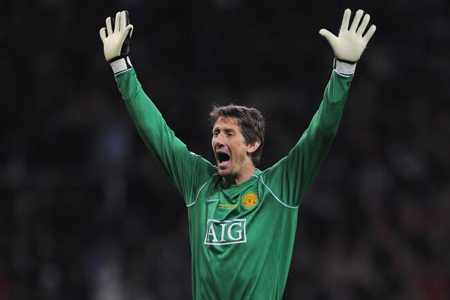 Hi-res-81189347-edwin-van-der-sar-of-manchester-united-reacts-during-the_crop_north