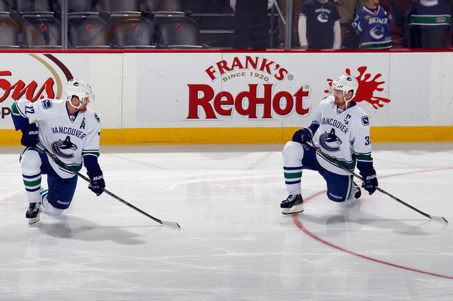 Hi-res-185873361-daniel-sedin-and-henrik-sedin-of-the-vancouver-canucks_crop_north